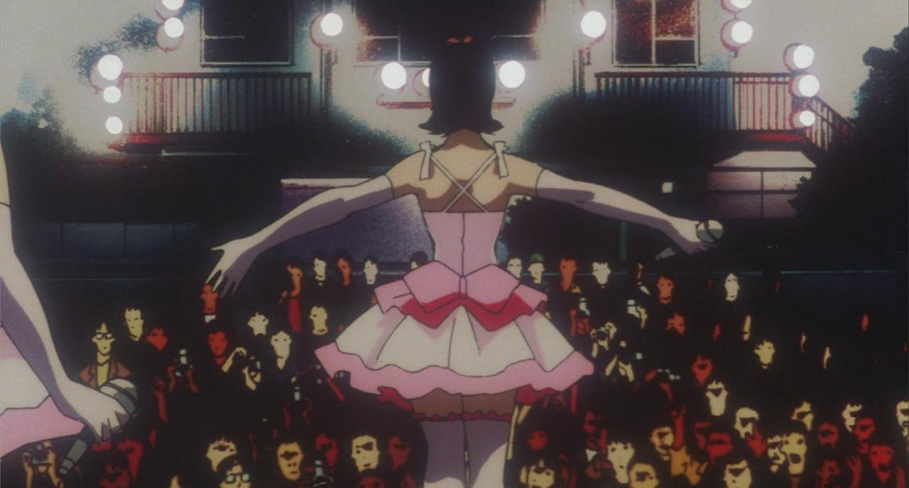 Mima performing to a large crowd